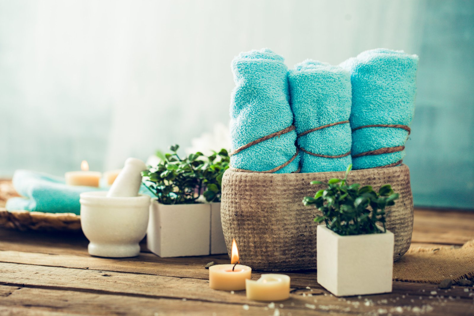 Spa and wellness setting with flowers and towels. Dayspa nature products