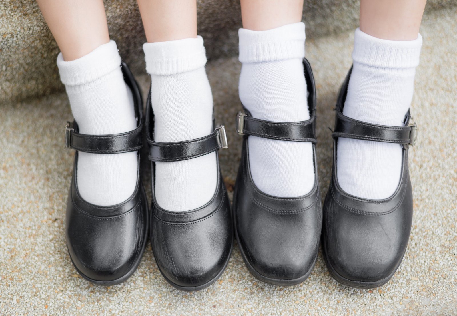 Asian Thai girls schoolgirl student feet with black leather shoes as a school uniform. It is teenage education fashion.